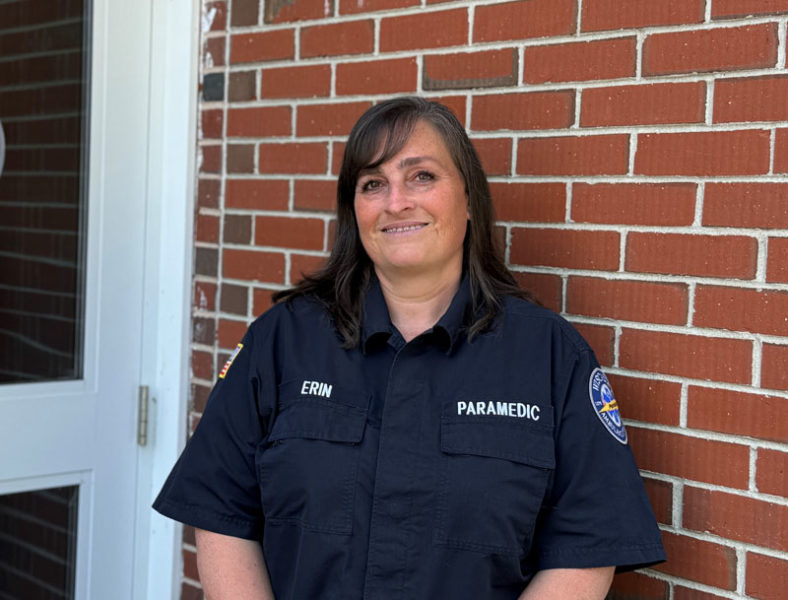 Wiscasset Emergency Medical Services Chief Erin Bean stands outside of her office at 51 Bath Road on Tuesday, June 4. Bean has been an emergency medical service professional for over 25 years, but when shes not answering the calls of the town, shes at her home in Dresden tending to her gardens and making bagels for her children. (Johnathan Riley photo)