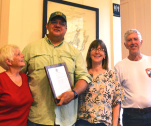 The Westport Island Select Bard presented the town's Emergency Management Agency Director Jason Kates with a Spirit of America Award during the annual town meeting, Saturday, June 22. Shown from left: Select Board Chair Donna Curry, Kates, select board members Lisa Jonassen and Jeff Tarbox. (Charlotte Boynton photo)