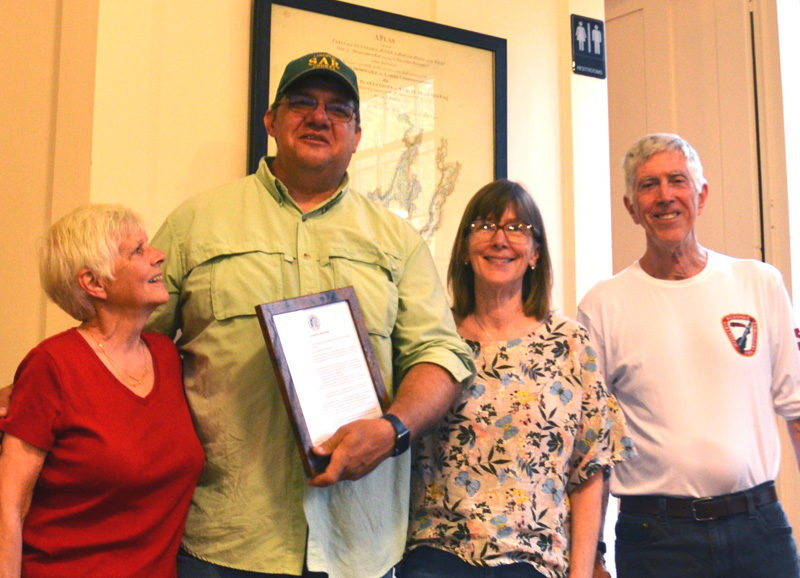 The Westport Island Select Bard presented the town's Emergency Management Agency Director Jason Kates with a Spirit of America Award during the annual town meeting, Saturday, June 22. Shown from left: Select Board Chair Donna Curry, Kates, select board members Lisa Jonassen and Jeff Tarbox. (Charlotte Boynton photo)