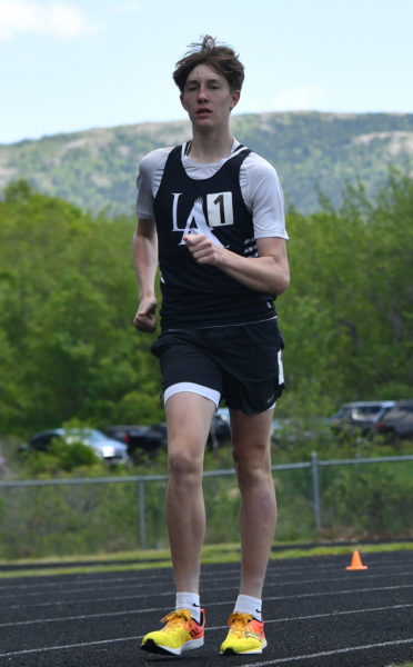 Lincoln Academy's Roan Donaghy on his way to win the 1600m racewalk at the Class B state championship in Bar Harbor on Saturday, June 1. (Mic LeBel photo)