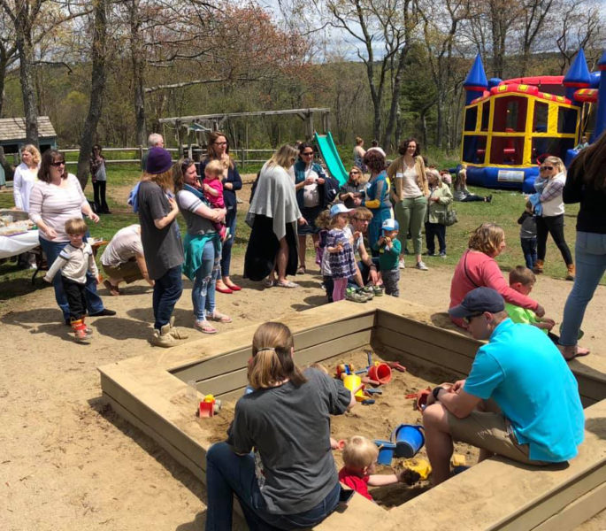 Families and friends join in the celebration at an earlier Sheepscot Valley Childrens House annual spring festival. (Courtesy photo)