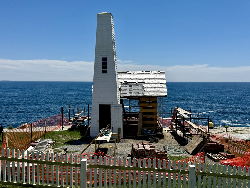 The bell house sits on the edge of the coast  at Pemaquid Point Lighthouse Park in Bristol on Thursday, June 27. The historical structure had its eastern, ocean-facing wall knocked in by a wave that struck during the first of back-to-back January storms. (Johnathan Riley photo)