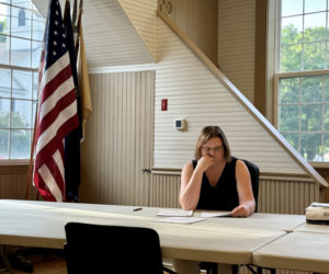 Bristol Select Board member Kristine Poland reviews the coversheet of the feedback of town's draft comprehensive plan from of Maine Department of Agriculture, Conservation & Forestry in the town office on Wednesday, June 26. At the meeting, the select board agreed to reconvene the comprehensive plan committee that was disbanded after the draft was submitted April 3 to address feedback from the state. (Johnathan Riley photo)