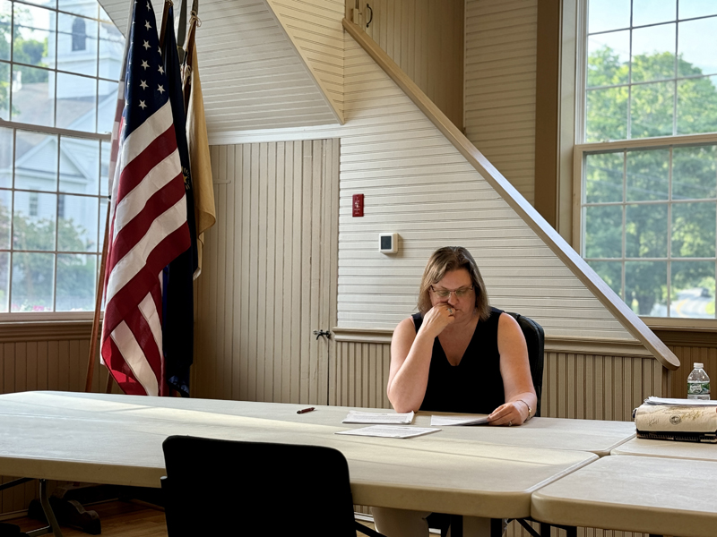 Bristol Select Board member Kristine Poland reviews the coversheet of the feedback of town's draft comprehensive plan from of Maine Department of Agriculture, Conservation & Forestry in the town office on Wednesday, June 26. At the meeting, the select board agreed to reconvene the comprehensive plan committee that was disbanded after the draft was submitted April 3 to address feedback from the state. (Johnathan Riley photo)