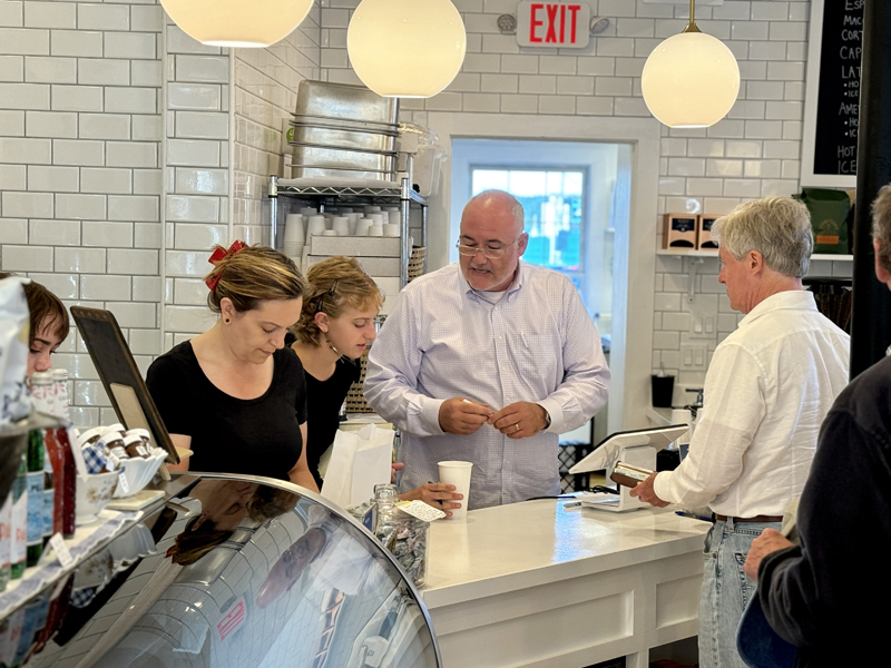 Prudence Kiessling (left), Alyssa Abbotoni, and Roger Kiessling run the counter at Rue 77 on Main Street in Damariscotta on Friday, June 28. In addition to a variety of espresso and coffee drinks, the cafe serves gelato from Gelato Fiasco in Brunswick, breakfast sandwiches utilizing local ingredients, and premade baguette sandwiches. (Johnathan Riley photo)