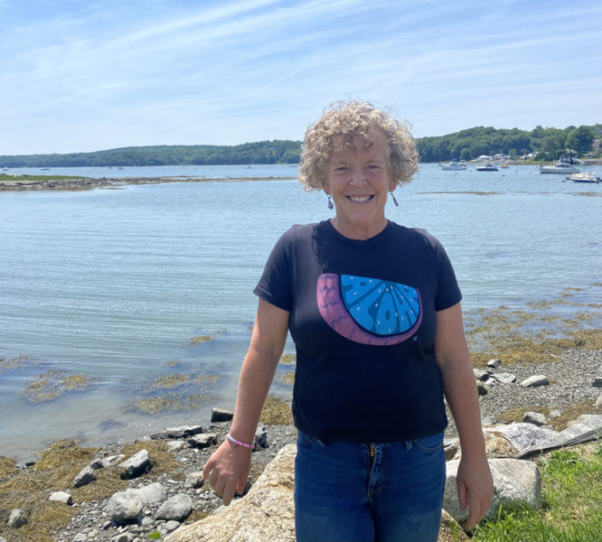 Kristie Houghton stands in front of the Damariscotta River. The Newcastle resident has made her mark on the community as a preschool teacher at Fiddlehead, a kindergarten, second, and third grade teacher at GSB, and will now move onto Lincoln Academy as a college and career counselor. (Frida Hennig photo)