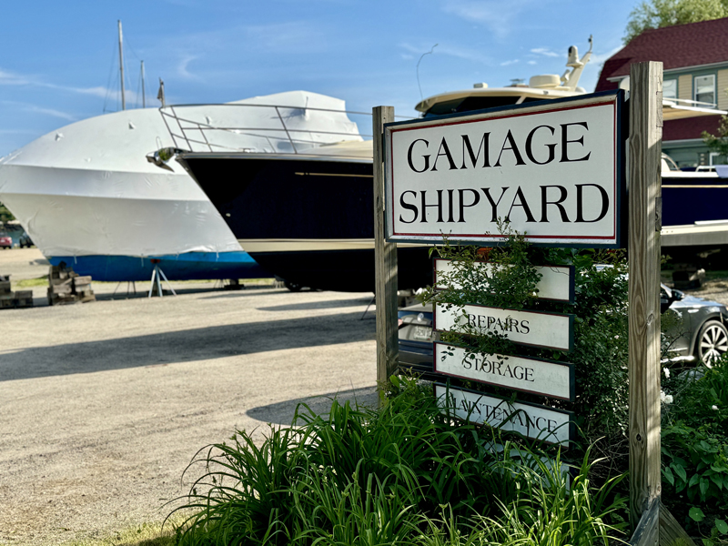 The Gamage Shipyard sign at the entrance of the businesss property on Wednesday, July 3, off of Gamage Drive in South Bristol. On June 28, the shipyard was sold to Maine Yacht Center in Portland. According to representatives from the Portland-based business, the full-service shipyard will retain its name. (Johnathan Riley photo)