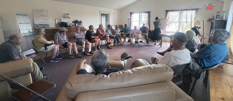 Past and present Morris Farm Trust members and supporters gather at The Morris Farm in Wiscasset on Thursday, July 18 for an informational meeting hosted by Maine Farmland Trust. The Morris Farm Trust is selling the farm to Maine Farmland Trust. (Piper Pavelich photo)