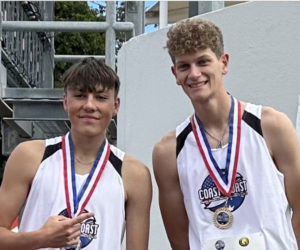 Will Rush (right) won the gold medal in the triple jump at the Coast2Coast International Meet in Gold Coast, Australia on Tuesday, July 16. Rush is pictured with USA teammate Stan Stremick (left) who won the silver, and his Coast2Coast jumping coach Nicole Lincoln. (Courtesy photo)