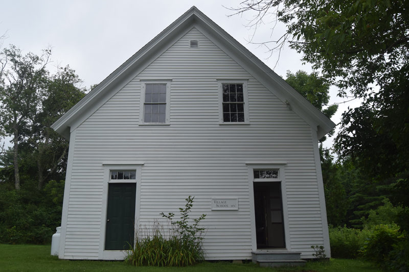 The Village School at Puddle Dock in Alna was added to the National Register of Historic Places June 28. Built in 1874, the one room school remained in use until 1962. Typical for the period in which it was constructed, there are separate entrances for the boys and girls. The boys' entrance is on the right. The girls' entrance is on the left. (Nolan Wilkinson photo)