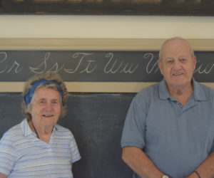 Joan Gregoire and Joseph Seigars stand in their former school Tuesday, July 30. Both were students at the Village School over 80 years ago. (Nolan Wilkinson photo)