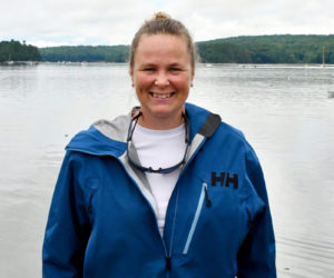 Laura Slye has spent her life on or around the water, working in the marine industry and sailing. Two other passions are horses and dogs; she has also worked as a dog trainer and caretaker for a time. "Dogs, horses, and boats. That's me, and that's it," she said. (Dylan Burmeister photo)