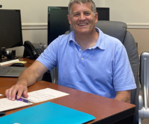 New Lincoln Academy dean of students Don Legere sits in his office at the high school. Legere has formerly worked at Greely High School in Cumberland and Mt. Ararat High School in Topsham. (Frida Hennig photo)