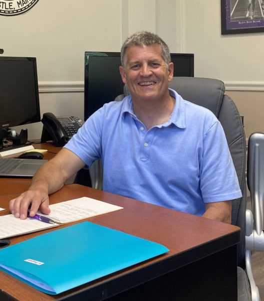 New Lincoln Academy dean of students Don Legere sits in his office at the high school. Legere has formerly worked at Greely High School in Cumberland and Mt. Ararat High School in Topsham. (Frida Hennig photo)