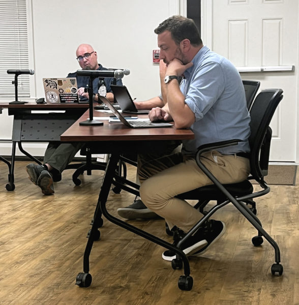 Newcastle Planning Board Chair Ben Frey (left) looks to Newcastle Town Planner Michael Martone to explain the proposed amendments to the town's core zoning code ordinance, which define and regulate the retail sales of firearms in the vicinity of schools, during a public hearing the evening of Thursday, Sept. 19. (Piper Pavelich photo)