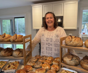 Ari Barter, owner of Walpole Wildflours, stands behind her cooling baked goods in her home kitchen in Walpole on Friday, Sept. 20. Barter learned how to bake when one of her children developed a food sensitivity. (Johnathan Riley photo)