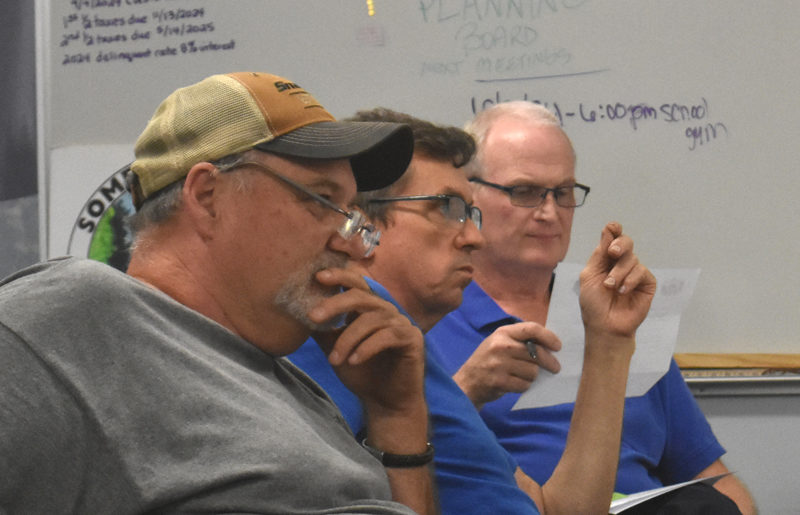 From left: Somerville Select Board members Willard Pierpont, Don Chase, and Chair Donald Witmer-Kean consider the resignations of town office staff and road commissioner on Wednesday, Sept. 18. Witmer-Kean also announced his impending resignation from the select board that evening. (Molly Rains photo)