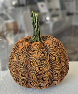 Damariscotta artist Jacques Vesery has donated an exquisitely carved and jewel-like wooden pumpkin for a raffle. (Courtesy photo)