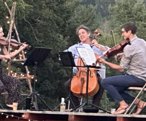 Katherine Liccardo, Ben Noyes (center), and Matt Consul perform at Pumpkin Vine Family Farm in Somerville in 2023. (Courtesy photo)