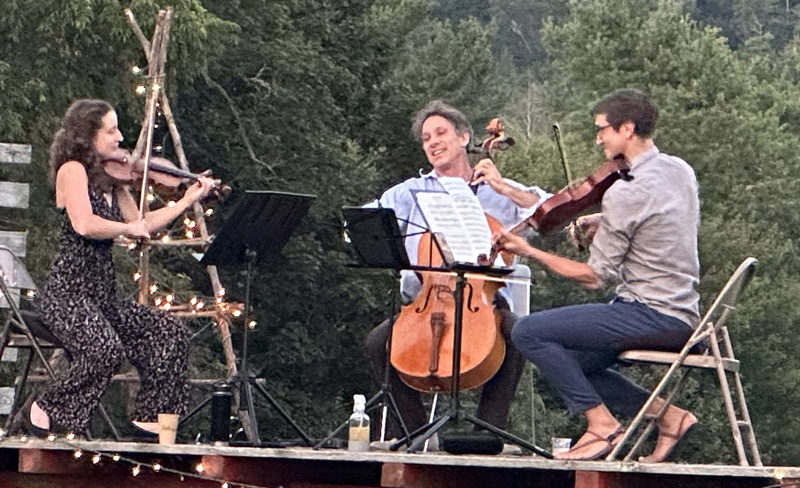 Katherine Liccardo, Ben Noyes (center), and Matt Consul perform at Pumpkin Vine Family Farm in Somerville in 2023. (Courtesy photo)