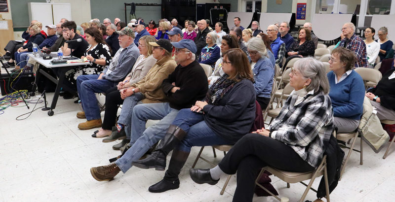 Roughly 60 audience members gather in the cafeteria at the Great Salt Bay Community School in Damariscotta the evening of Thursday, Oct. 10 for a candidates forum co-hosted by The Lincoln County News and Boothbay Register. Attendees listened as candidates for Senate District 13 and House District 46 discussed topics such as affordable housing, health care, and education. (Piper Pavelich photo)