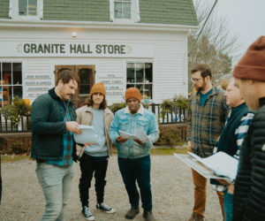 Cast and crew of "McCurdy Point" discuss a scene in front of Granite Hall Store in Round Pond. Filming took place in 2022. (Courtesy photo)