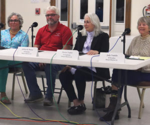 From left: Senate District 24 candidates Suzanne Andresen, I-West Bath; Jeffrey Pierce, R-Dresden; Denise Tepler, D-Topsham; and House District 53 candidate Judith "Judy" Tunkle, D-Dresden; smile as audience members applaud at the end of a forum at Pownalborough Hall in Dresden the evening of Monday, Sept. 30. (Piper Pavelich photo)