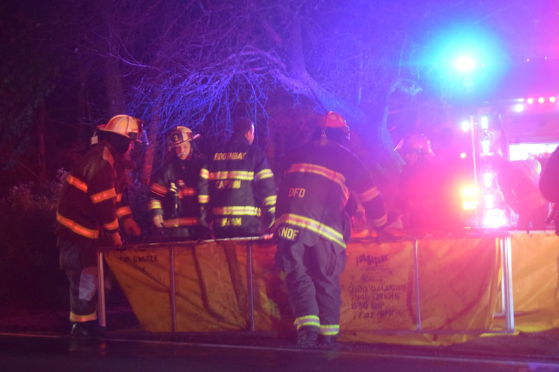 Boothbay and Damariscotta firefighters set up a portable dump tank to establish a water supply at a structure fire at 634 River Road in Edgecomb on Friday, Oct. 25. Tanker trucks shuttled water to the scene from Newcastle's Clayton V. Huntley Jr. Fire Station 4.5 miles away. (Nolan Wilkinson photo)