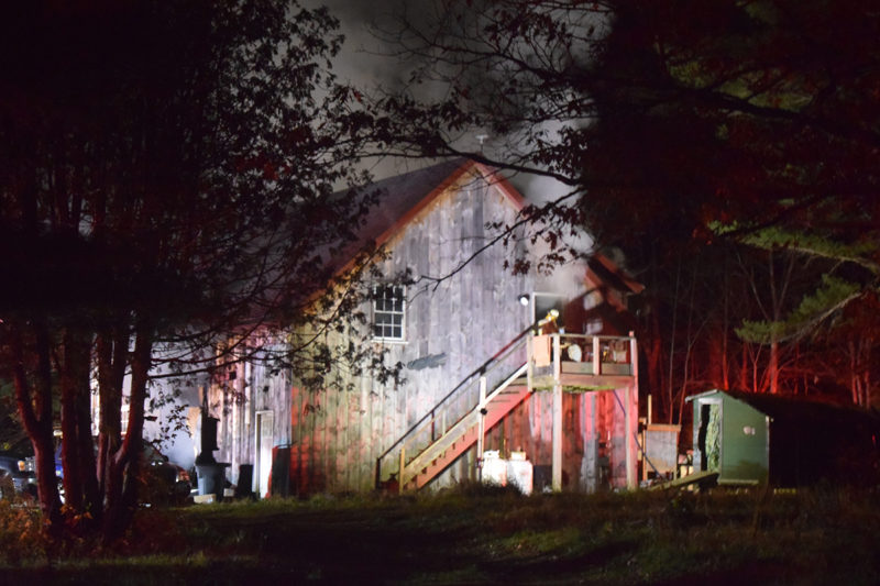 Smoke pours out of a home on River Road in Edgecomb on Friday, Oct. 25. According to Edgecomb Fire Chief Roy Potter, no humans were injured, but the fire did claim the life of one cat. (Nolan Wilkinson photo)