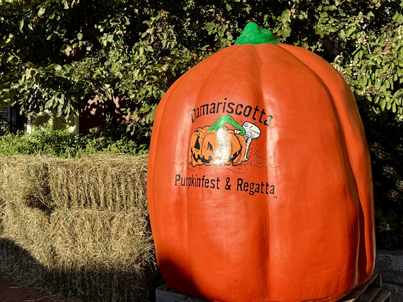 The iconic Damariscotta Pumpkinfest and Regatta pumpkin, made by Michael Morrison, sits in front of Skidompha Library in Damariscotta on Oct. 10. (Johnathan Riley photo)