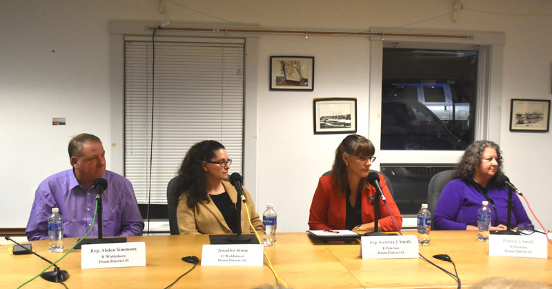 From left: House District 45 candidates Rep. Abden Simmons, R-Waldoboro; and Jennifer Stone, D-Waldoboro; and House District 62 candidates Rep. Katrina J. Smith, R-Palermo; and Pamela J. Swift, D-Palermo; listen to a question at a candidates forum in the Waldoboro municipal building on Monday, Oct. 7. (Molly Rains photo)