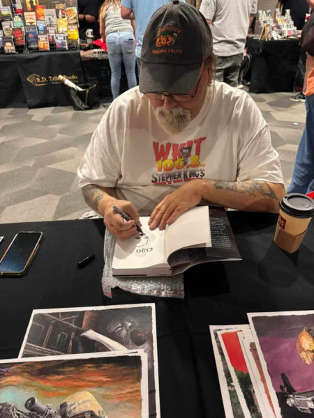 Glenn Chadbourne signs an autograph while at KingCon in Las Vegas. (Courtesy photo)