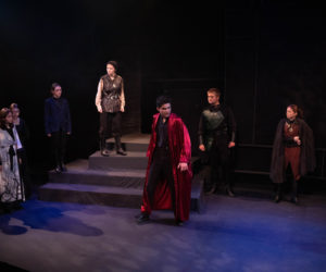 Macbeth (center), woken from a post-party stupor, swears to catch the killer of the king, an act he himself committed. The students of Lincoln Academy tackle Shakespeares tragedy at the Parker B. Poe Theater in final performances this weekend. (Photo courtesy Jenny Mayher)