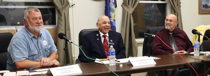 From left: House District 47 candidates Wayne Farrin, D-Jefferson, Rep. Edward "Ed" Polewarczyk, R-Wiscasset, and House District 49 candidate Vincent Brown, R-West Bath smile as audience members applaud at the end of a candidate forum at the Wiscasset municipal building the evening of Thursday, Sept. 26. (Piper Pavelich photo)