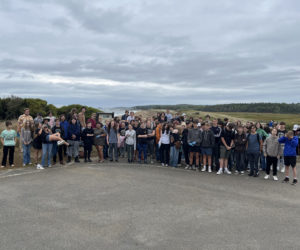 Over 150 Lincoln Academy students and staff participate in a beach cleanup at Reid State Park in September. (Photo courtesy Lincoln Academy)