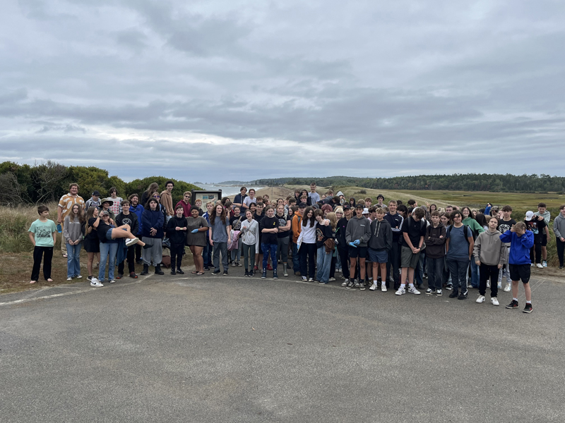 Over 150 Lincoln Academy students and staff participate in a beach cleanup at Reid State Park in September. (Photo courtesy Lincoln Academy)