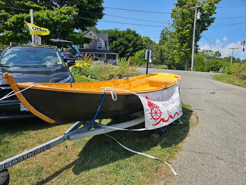 The eighth grade class is selling boat raffle tickets to fundraise for their trip to Washington, D.C. (Photo courtesy South Bristol School)