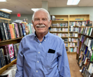 Richard Dick Marchi, of Bremen, stands in Shermans Maine Coast Book Shop in Damariscotta on Thursday, Nov. 14. Marchi, who was the principal at Great Salt Bay Community School in Damariscotta for almost 30 years, is a Navy veteran and works with the Kairos Prison Ministry International to help the spiritual needs of the incarcerated. (Johnathan Riley photo)