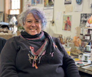 Mindy Star-Pfahler sits in the Sheepscot River Pottery studio in Edgecomb on Monday, Nov. 11. Star-Pfahler, of Nobleboro, taught art to students K-8 for 26 years in New Jersey before moving to Maine in 2013 with her husband. She continues to teach art at the CLC YMCA and has been a member of the Damariscotta Pumpkinfest and Regatta committee since 2018. (Johnathan Riley photo)