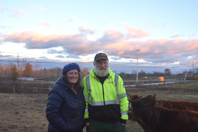 Allison Lakin and Neal Foley, of East Forty Farm and Dairy and Lakin's Gorges Cheese in Waldoboro, stand with two of their Jersey dairy cows. The couple bonded over their shared passions for farming, food, and educating others about the joys and lessons of sustainable agriculture. Food connects us all, and cheese is on almost everybodys plate on a daily basis, so thats not a bad food to connect people with," said Lakin, an award-winning cheesemaker. (Molly Rains photo)