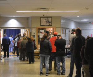 Voters wait in line in Jefferson to vote on Tuesday, Nov. 5. In addition to voting in the general election, residents cast votes in a special town meeting by referendum, approving solar farm restrictions and building ordinance updates. (Molly Rains photo)