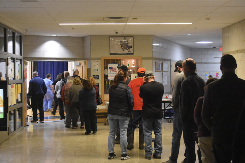 Voters wait in line in Jefferson to vote on Tuesday, Nov. 5. In addition to voting in the general election, residents cast votes in a special town meeting by referendum, approving solar farm restrictions and building ordinance updates. (Molly Rains photo)