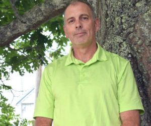 Scott White, a longtime local educator, stands in Damariscotta in 2021 just before taking on the role of Principal at Union Elementary School. Now, community members are rallying to support White and his family in the wake of a cancer diagnosis. (LCN file)