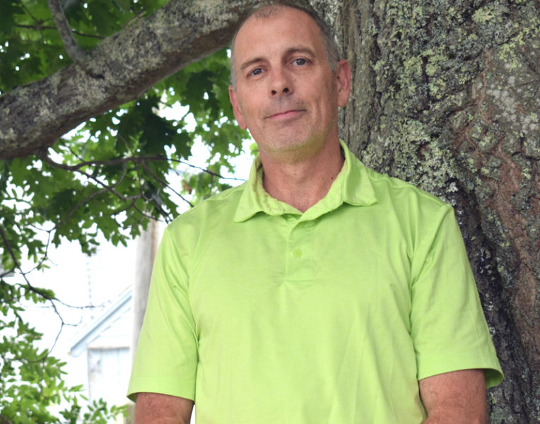 Scott White, a longtime local educator, stands in Damariscotta in 2021 just before taking on the role of Principal at Union Elementary School. Now, community members are rallying to support White and his family in the wake of a cancer diagnosis. (LCN file)