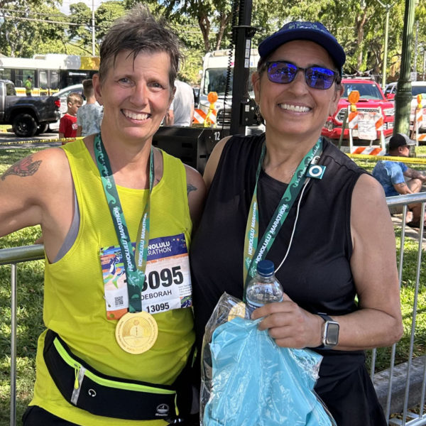 Deb Taylor and Andrea Di Benedetto are all smiles after finishing the Honolulu Marathon on Dec. 8. The marathon completed the best friends quest to run a marathon in all 50 states. (Courtesy photo)