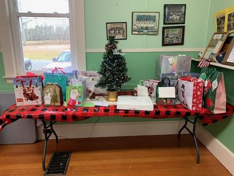 A table loaded with Secret Santa gifts is ready for the giving during the Nov. 18 meeting of the Medomak Valley Senior Citizens. (Courtesy photo)