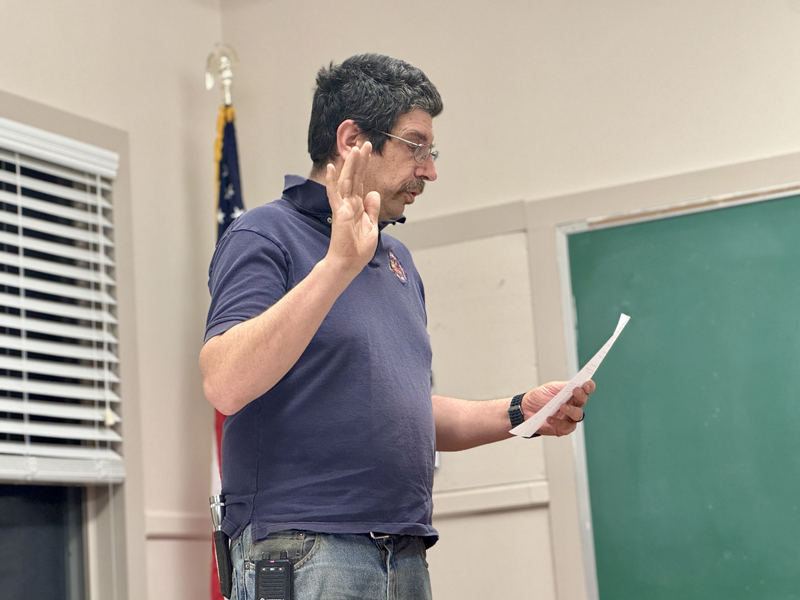 Eric Teele being sworn in as the new Bremen fire chief at the Bremen Select Board meeting on Thursday, Jan. 16 at the town office. Members of the department elected Teele over former Fire Chief Bruce Poland at their annual meeting on Jan. 12. (Johnathan Riley photo)