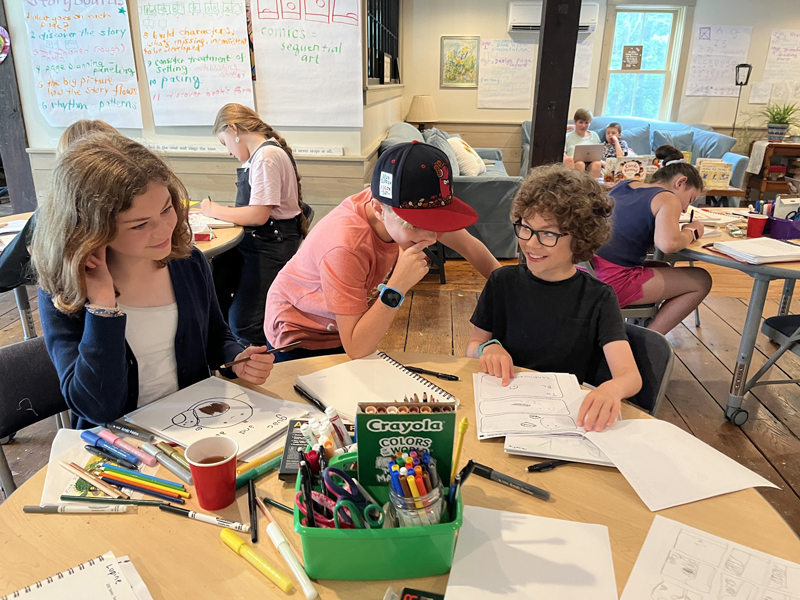 Campers Fina Record (left), Finn Sullivan (center), and Charlie Record exercise their creativity at The Merry Barn Writer's Retreat's summer adventures in creativity camp. The barn's use as a literacy and arts center ended this winter after six years. "Kids need opportunities to be kids," said former owner Stephanie McSherry, describing her vision for the barn. "They need to create and have choices and understand the power and the joy in that." (Photo courtesy Stephanie McSherry)