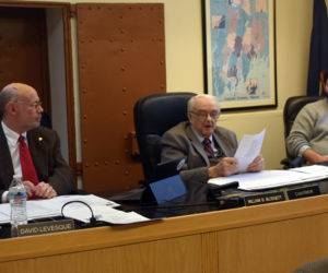 Lincoln County Commissioners David Levesque (left), William Blodgett (center), and Evan Goodkowsky prepare for a meeting the morning of Tuesday, Jan. 7. Levesque and Goodkowsky were elected unopposed in November 2024. One of the board's first acts was unanimously electing Blodgett chair. (Molly Rains photo)