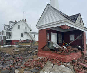 The bell house in Pemaquid Point Lighthouse Park in Bristol after it took significant damage in the Jan. 10, 2024 storm. In preparation for the Jan. 13, 2024 storm, park officials cleaned the debris, moved the bell to the back corner of the structure, and put up wooden beams for additional support. The white picket fence surrounding the fishermans museum was knocked down as well. (Johnathan Riley photo)